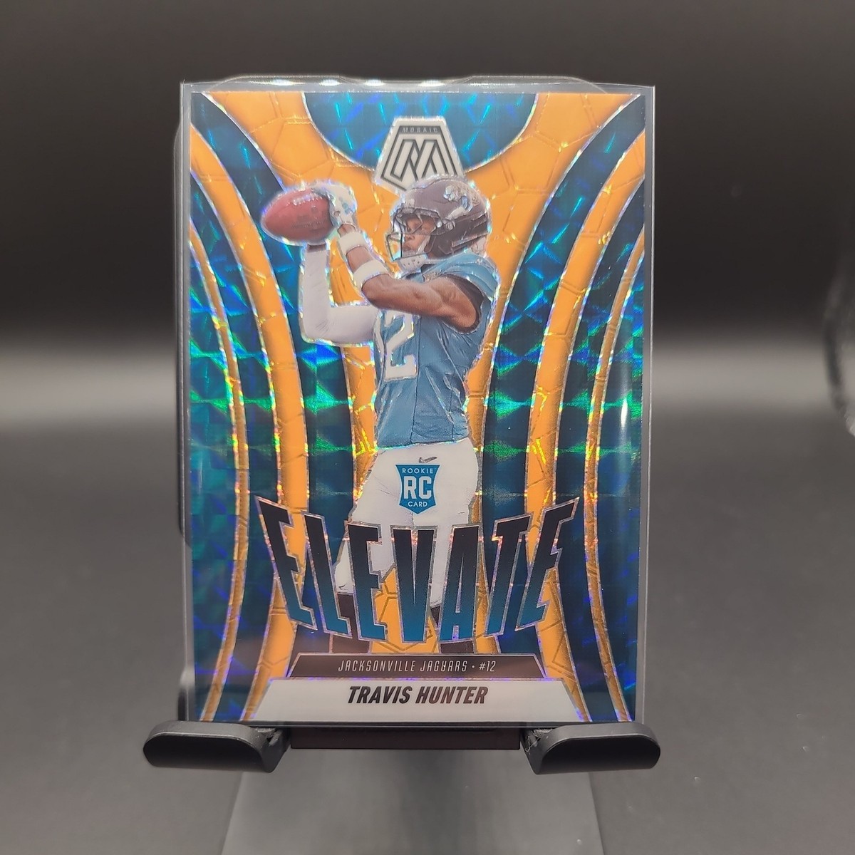 Martina コレクティブルカード #9991+MF 2025 Panini Mosaic Travis Hunter Rookie Elevate Orange - Jaguars