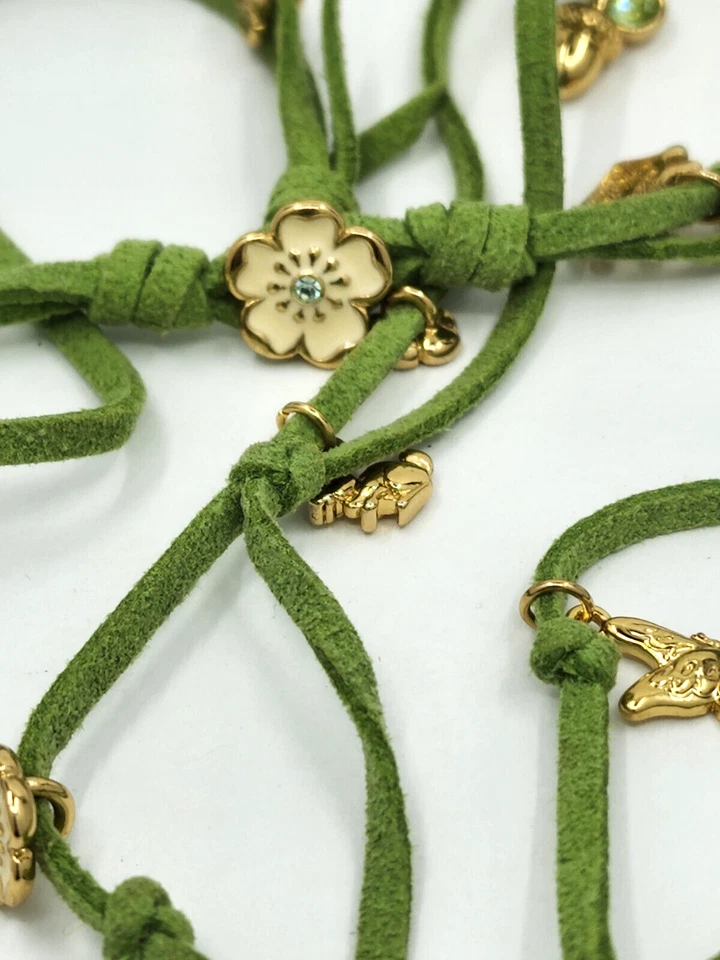 COLLAR DE CUERO TEJIDO CON DIJES DOBLES LATERALES TONO DORADO DISNEY LOVE KIDADA COUTURE Foto 2 de 4