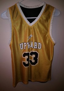 black and gold reversible basketball jersey