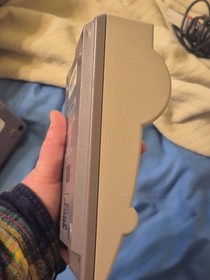 Classic NES game console. 2 controllers and NES advantage in box with packaging