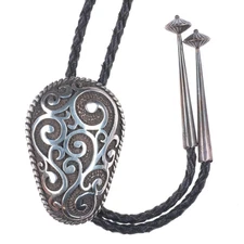1991 Chambers Sterling Silver southwestern scrollwork bolo tie