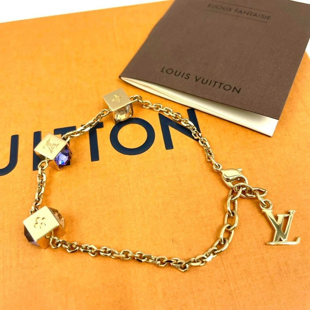 LOUIS VUITTON（LV） Bracciale Louis Vuitton Gamble M65209 Placcato Oro Blu Chiaro Dadi Charm YK935