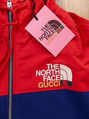 GUCCI x THE NORTH FACE blue & red logo print zip track GUCCI x THE NORTH FACE blue & red logo print zip track