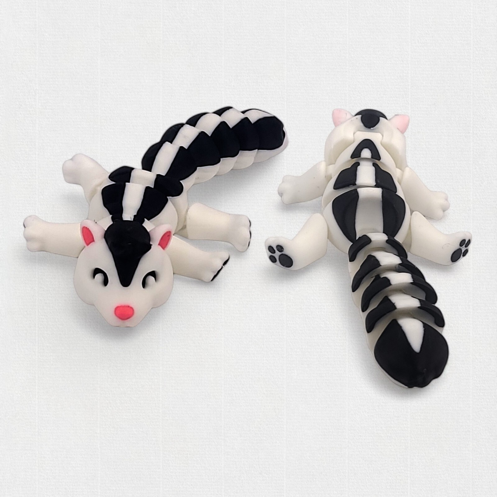 Colorful Articulated Skunk Desk Buddy - 3D Printed Fidget Toy for Stress Relief!