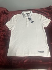 True Religion polo shirt in white, size M. Classic fit with embroidered logo.