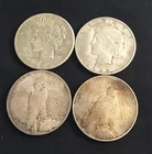 peace silver dollars, perfect for bullion, 4 coins in each set,  rough culls