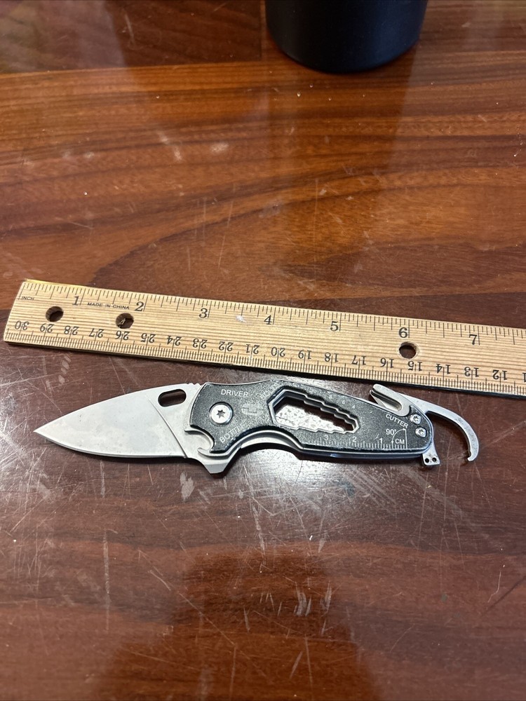 Multi tool Pocket Knife True Utility Bottle Opener Bolts Driver Measure