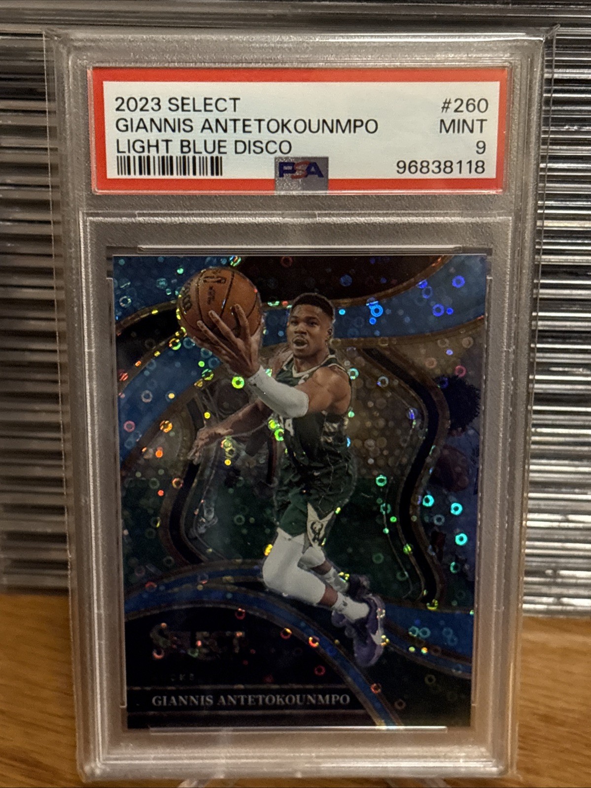 2023-24 Panini Select-Courtside Giannis Antetokounmpo Light Blue Disco /99 PSA 9