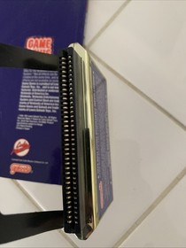 Galoob Game Genie Nintendo NES Game Cartridge Adapter with Code Book Manual 1991
