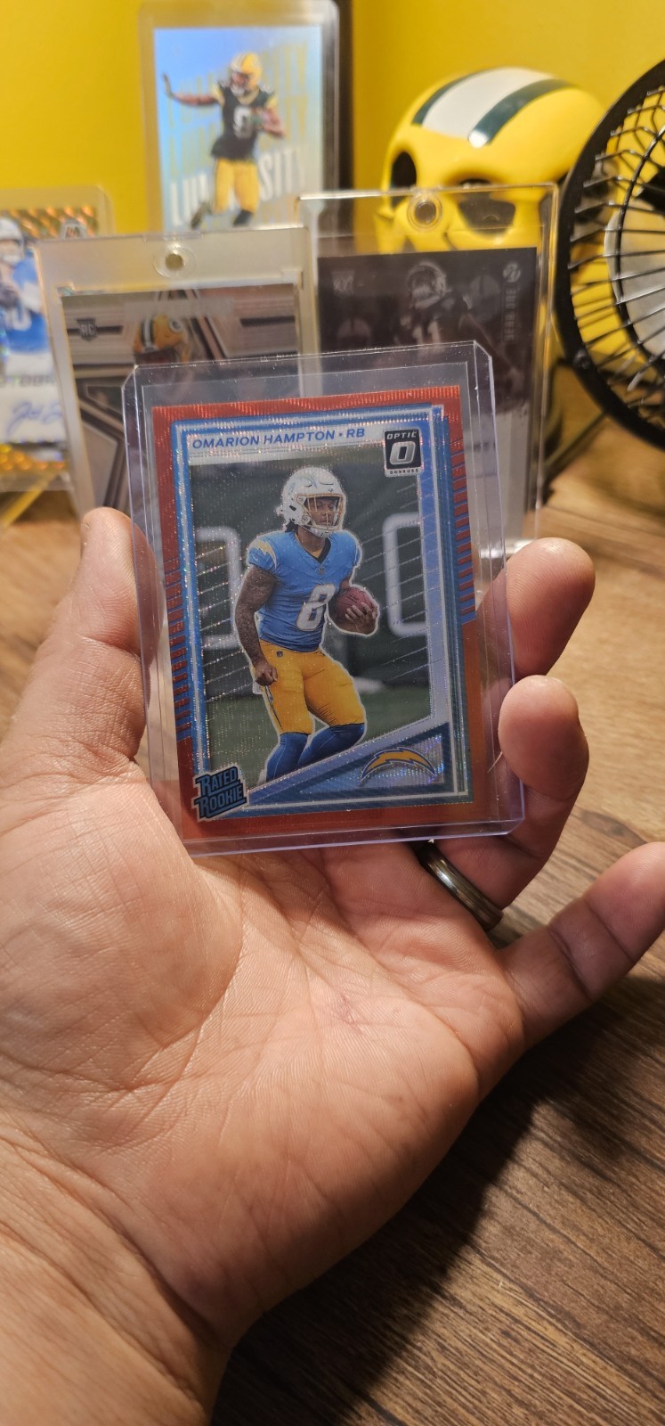 2025 Panini Donruss Rated Rookie Omarion Hampton Optic Preview Red Wave (RC)