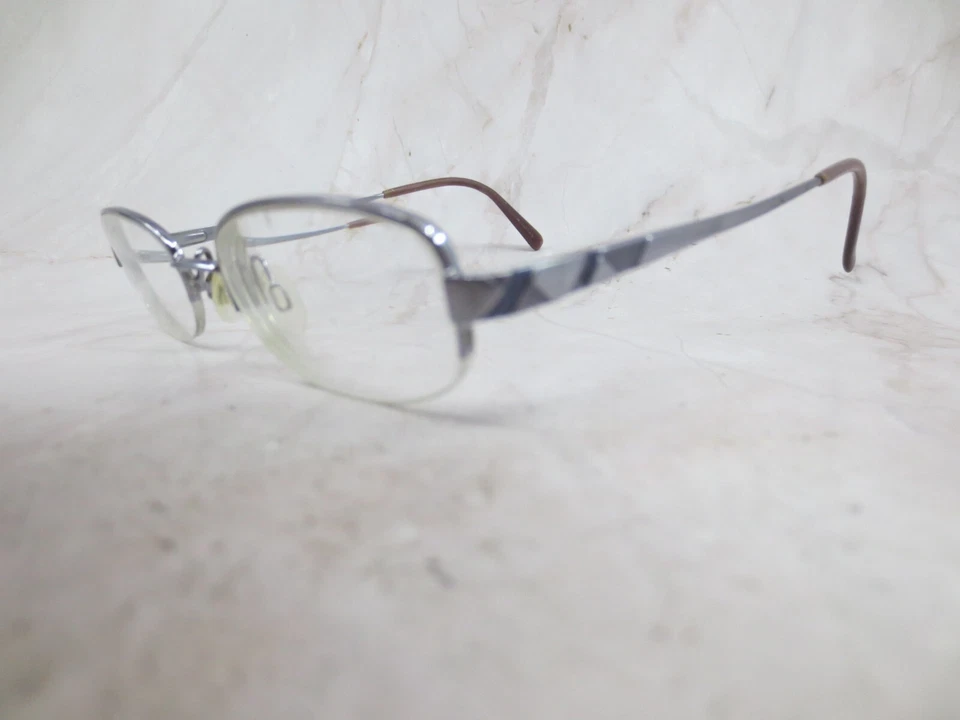 Encantador marco de gafas ARistar AR6981 para mujer de metal plateado medio borde 47-18-135 Foto 2 de 4