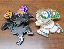 (2) Rare "SQUIGGLY" Halloween Black Cat + Ice Skating Snowman Walmart Lapel Pins
