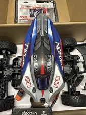 Buggy Arrma Typhon Grom 1/18 RTR 4x4 azul con batería