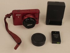 Nikon 1 J1 10.1MP Mirrorless Camera with 10mm Lens  SC 4238  7 MINOR DAMAGES