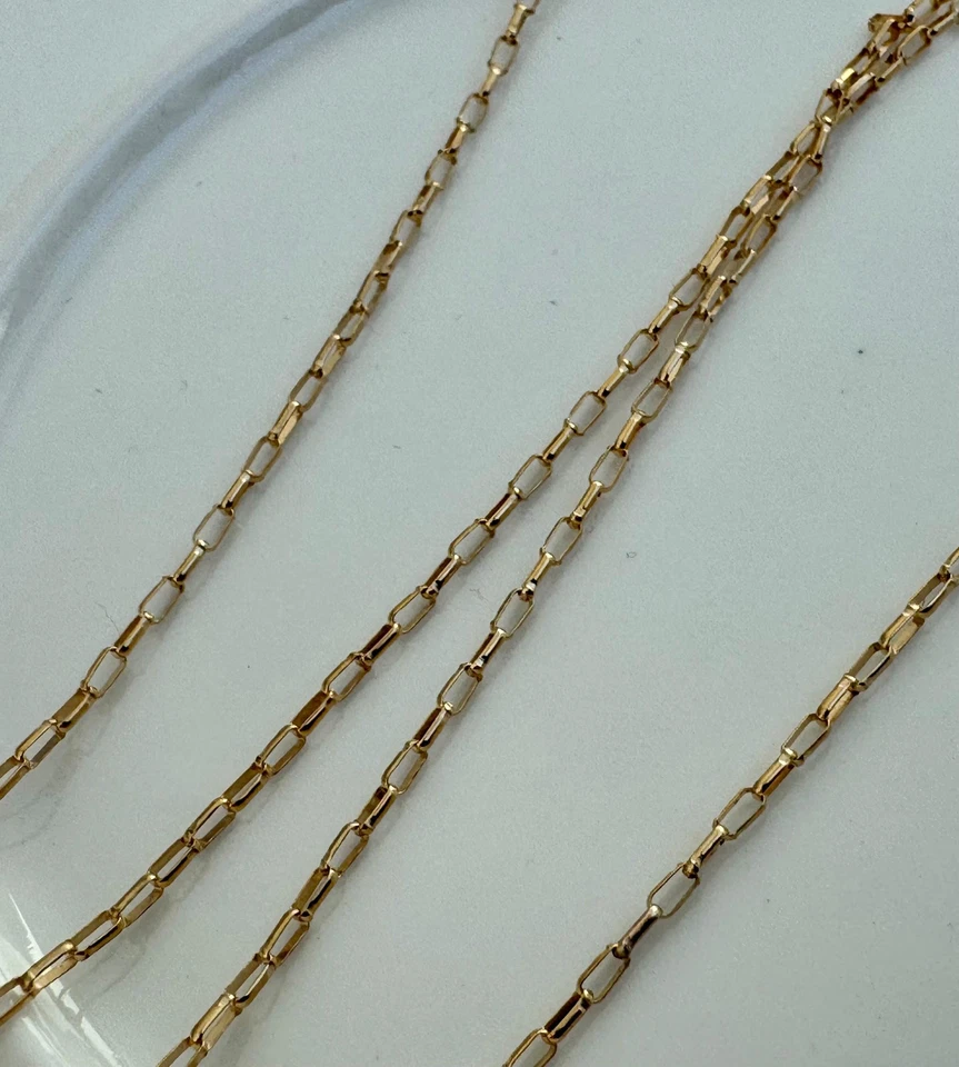 Cadena enrollable ovalada plana de 1,4 mm x 3,5 mm rellena de oro amarillo 14K a pie (C10533F) Foto 2 de 4