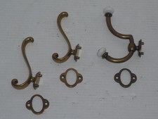 VINTAGE LOT OF (3) BRASS COAT HAT HOOKS WITH WALL PLATES (1) PORCELAIN TIP COOL