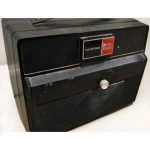 Keystone K-639 Dual Format 8mm Filmstrip Projector with 5 film reels. (Working)