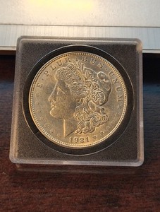 1921 d  morgan silver dollar - 0.9 silver - brilliant uncirculated
