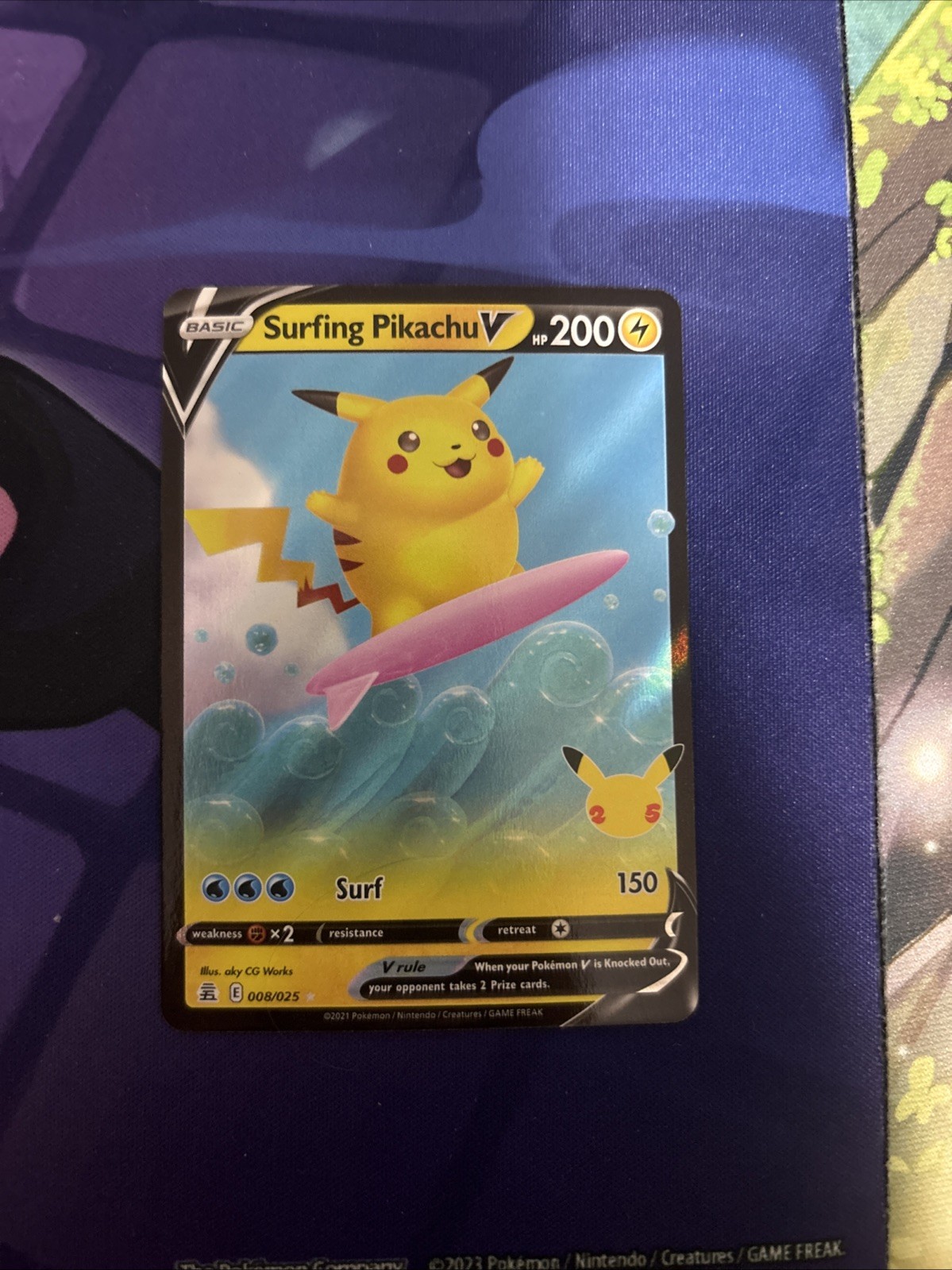 Surfing Pikachu V 008/025 Celebrations Holo NM Pokémon Card 25th Anniversary