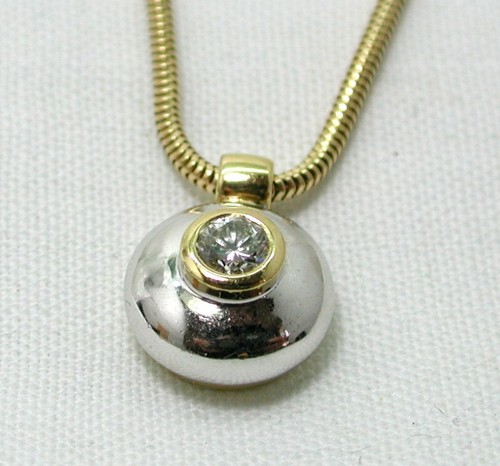 0.33CT Diamond Pendant And Chain 
