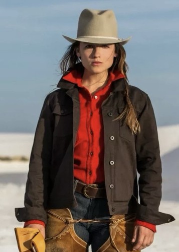 Brown canvas FILSON women’s jacket with red collar, front buttons, and tan leather belt loops.
