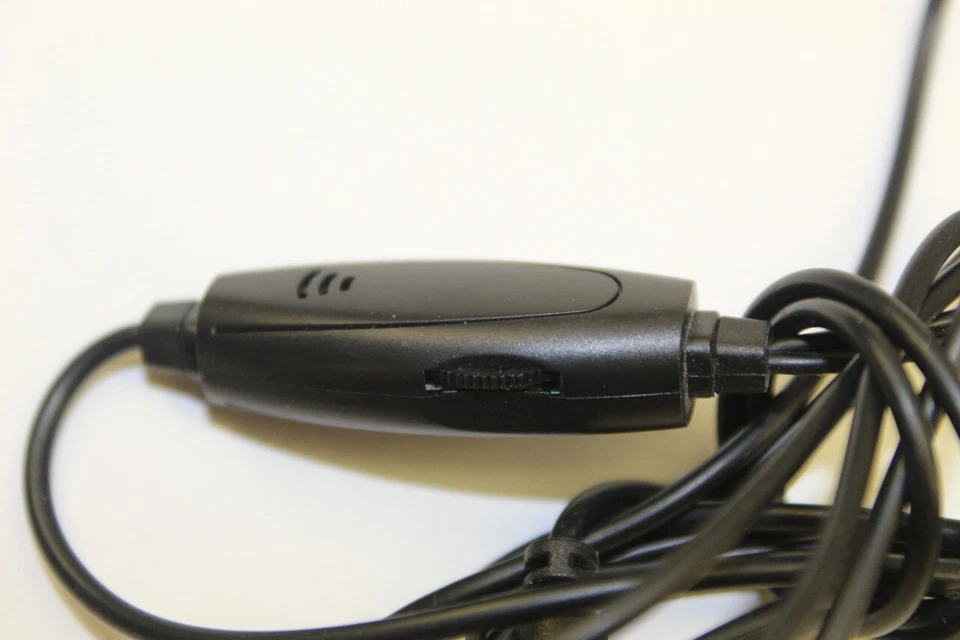 Auriculares grises con micrófono y auricular Verizon Foto 4 de 4