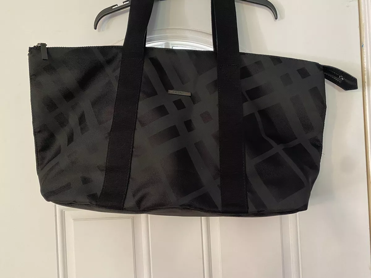 Burberry fragrance duffle clearance bag