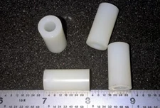 NYLON SPACERS  1/2"  ROUND  1/4"  HOLE  1" LONG  - 25 pcs