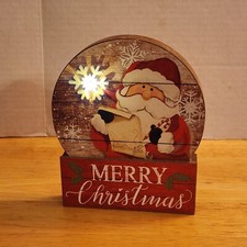 Merry Christmas SANTA CLAUS Wooden Snowglobe Shape Decor SNOWFLAKE Lights Up 