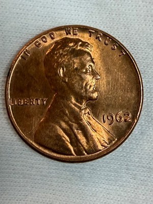 1962 penny no mint mark/ missing part of the 2 in date/ L On Rim.          #P569