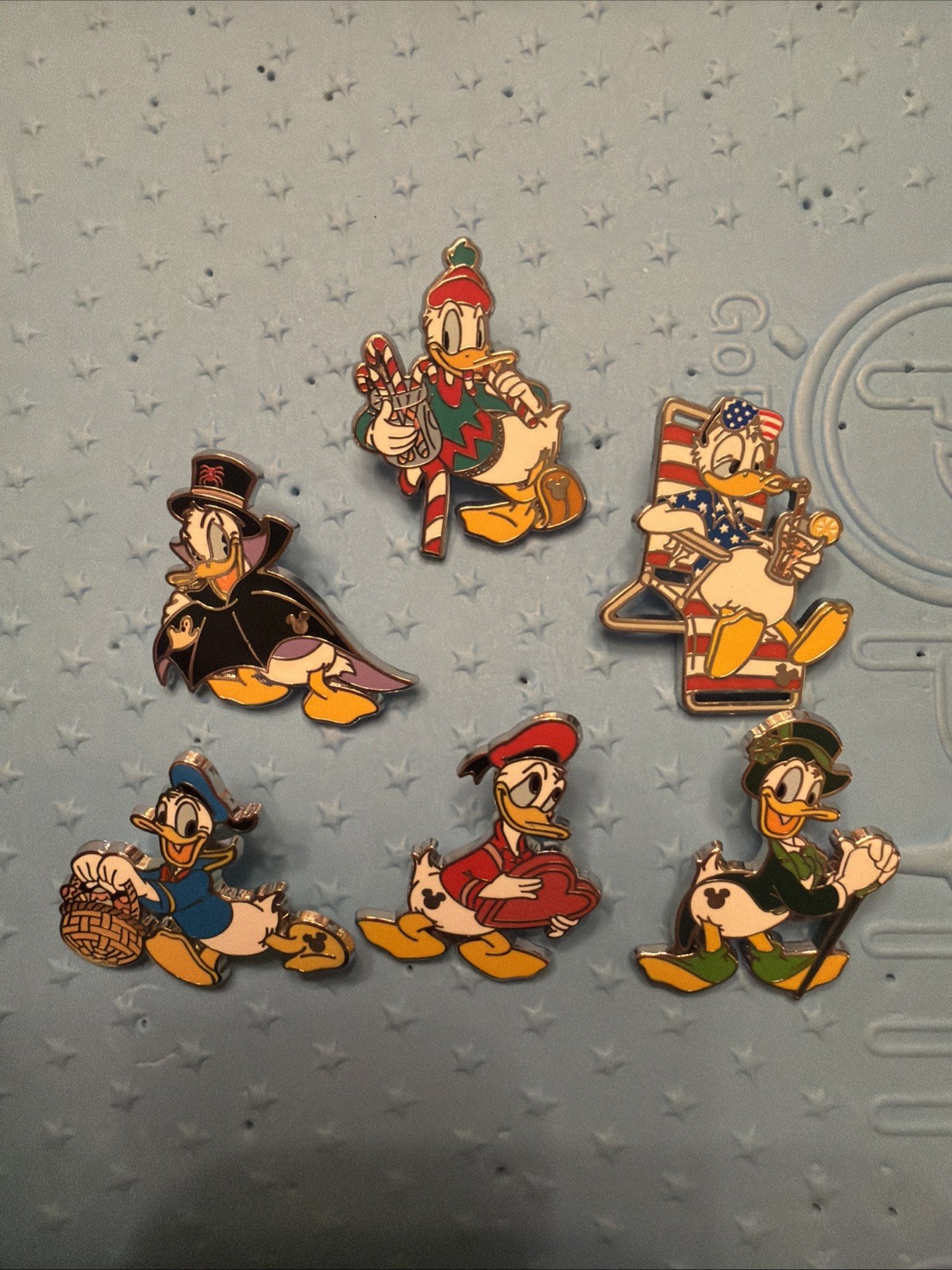 Disney 2025 WDW Donald Duck Holidays Hidden Mickey Mystery Pin Set with Chaser