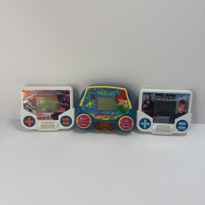 Lot Of 3 Tiger Electronics Handhelds Home Alone 2, Little Mermaid,Street Fighter
