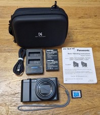 Panasonic Lumix DMC-TZ100 Mirrorless SLR 20.1 Megapixel Camera, Case 32gb & Card
