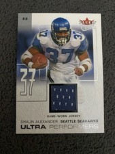 2004 Ultra Football Ultra Performers Platinum Shaun Alexander Game Used #16/19