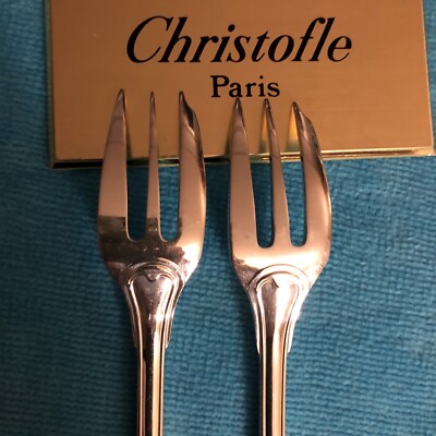 Lot de 12 fourchettes à gâteau Christofle, modèle Coquille, en mé