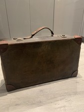 Vintage brązowa skórzana walizka z inicjałami H.G.P