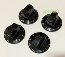 Set of 4 black Kenmore burner control knobs part 8272802 stove range