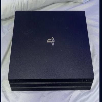 Sony PlayStation 4 Pro Console with Controller & Games Spider-Man Madden 22
