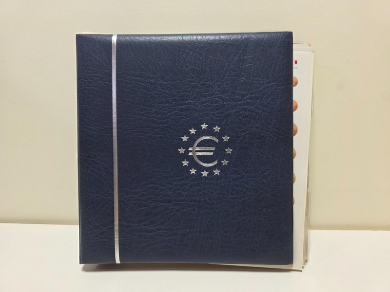 Lot Of 62.50 PLUS Worth Of World Euro Coins Coin with Numis Collection Album
