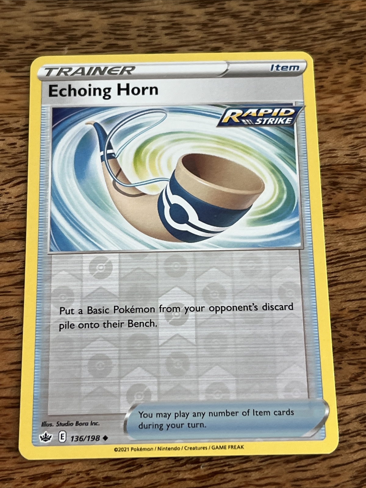 Echoing Horn Trainer Pokemon Card 136/198 Reverse Holo - Rapid Strike Item