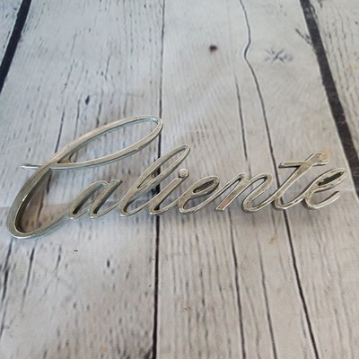 Mercury Comet Caliente Fender  Script Emblem 