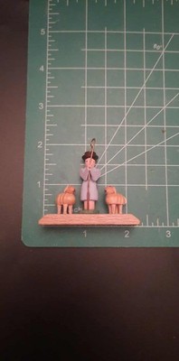 Adorable vintage wooden miniature sheep herder with sheep