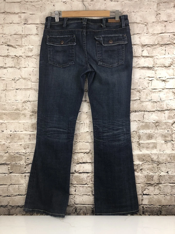 Jeans Yanuk corte bota elástico talla 29 x 30 Foto 2 de 4