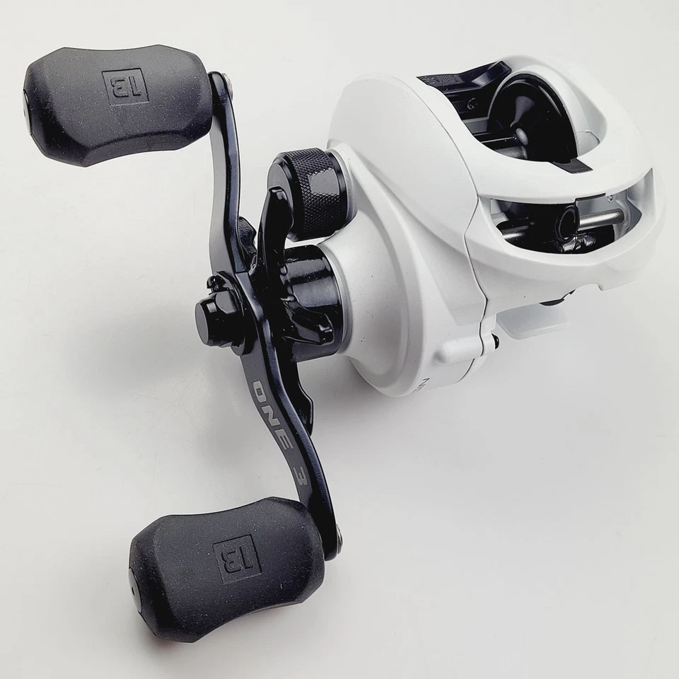 Carrete de baitcasting de pesca 13 Origin C R/H 7BB blanco nuevo en caja Foto 4 de 4