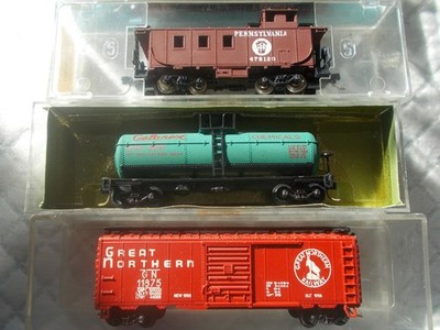 Atlas THESE THREE BOX CARS AND CABOOSE ARE ATLAS THE TANK CAR IS AURORA  N-scale