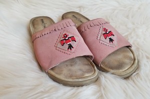 fringe slip on sandals