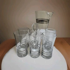 Pitcher And 6 Glasses Small crack On Spout   