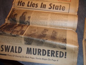 2 newspapers 1 Chicago Tribune November 23, 1963, 1 Sun Times November 25, 1963