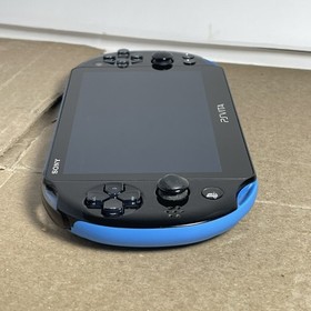 Sony PS Vita 2000 Slim PCH-2000 - Aqua Blue + Charger! Works Good! Minor Flaw!