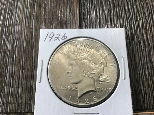 1926 p silver Pease dollar. BU